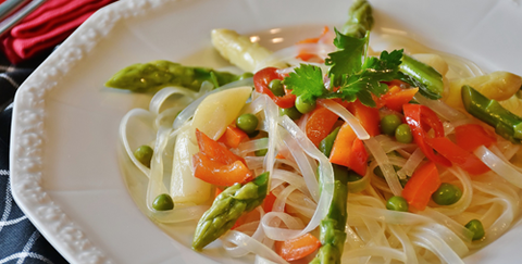 Gluten free sundried tomatoes and asparagus with parmesan and rice noodles