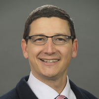 Dr. Christopher Holet